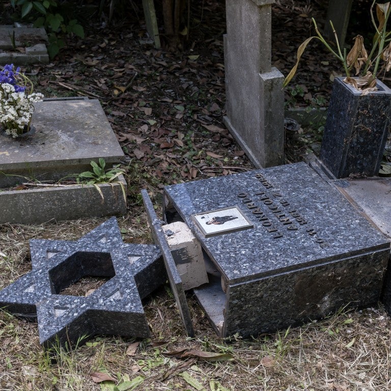 Cemetery with vandalized Jewish tombstone 