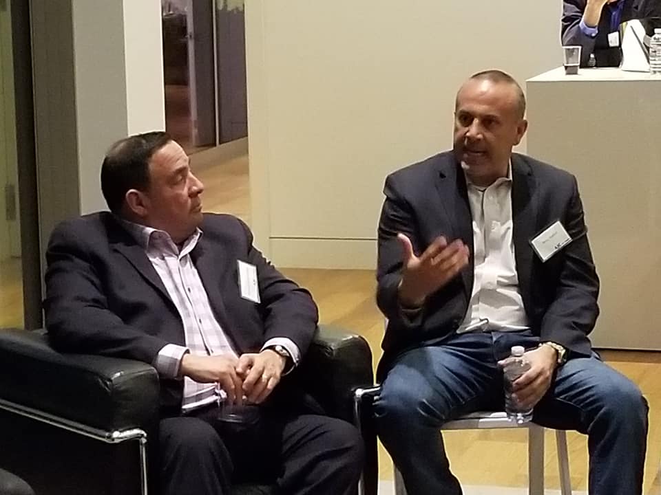 Photo of 2 Latin American Project Interchange Alumni in conversation