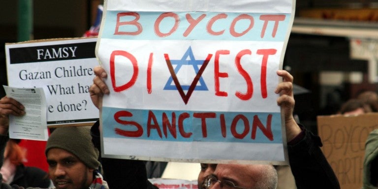 Photo of a Boycott Divest Sanction sign at a BDS protest