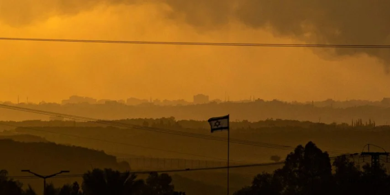 Orange skies with smoke rolling into the air