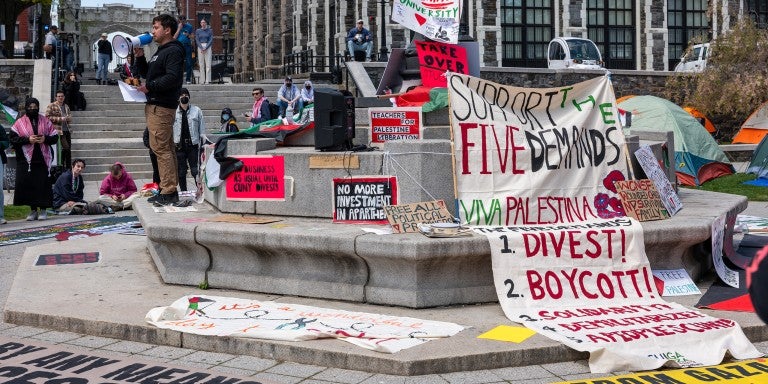 Signs at City College that says "Support the Five Demands - Viva Palestina - Divest! Boycott! Solidarity..."