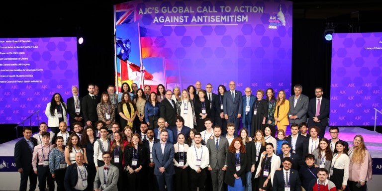 Image of AJC CEO Ted Deutch joined at the opening plenary of AJC Global Forum 2024 by 28 Jewish leaders from around the world to announce AJC’s Global Call to Action Against Antisemitism.