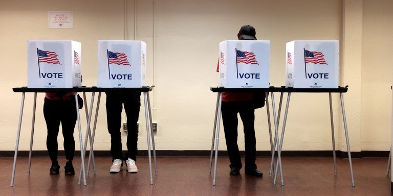People cast their in-person early ballot for the 2024 general election at the Northwest Activities Center on October 29, 2024 in Detroit, Michigan. 