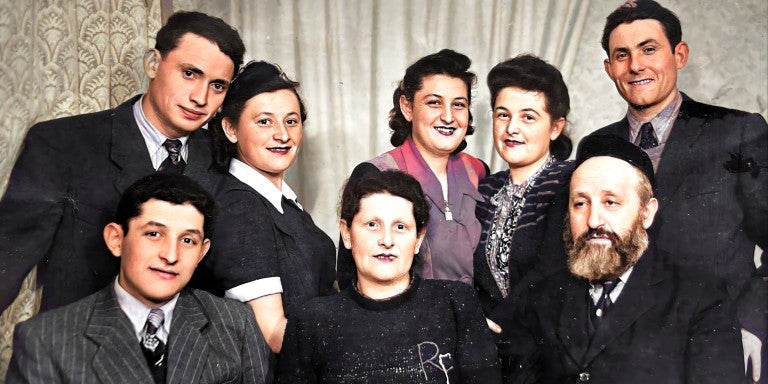 A group of the Fink family posing for a photo together in 1950.