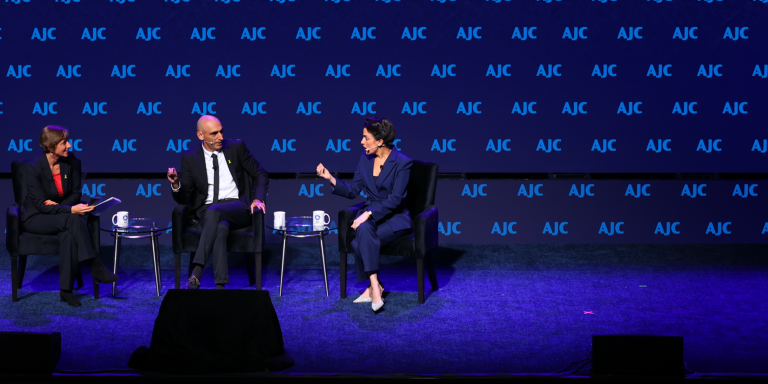 Photo of three of Israel’s leading journalists—Nave Dromi, Asaf Liberman, and moderator Nurit Canetti at AJC Global Forum 2025
