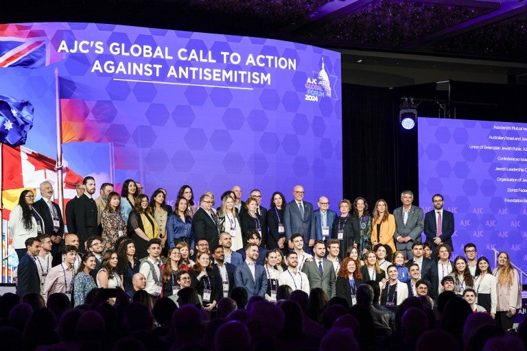 Image of AJC CEO Ted Deutch joined at the opening plenary of AJC Global Forum 2024 by 28 Jewish leaders from around the world to announce AJC’s Global Call to Action Against Antisemitism.