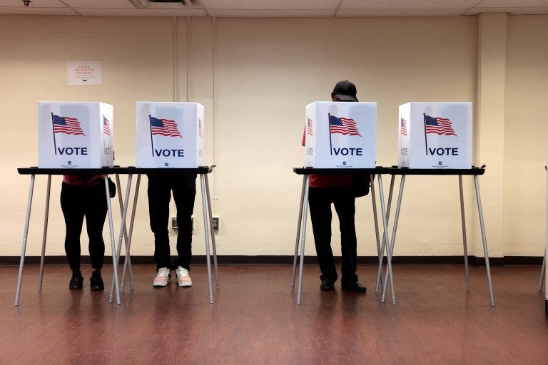 People cast their in-person early ballot for the 2024 general election at the Northwest Activities Center on October 29, 2024 in Detroit, Michigan. 