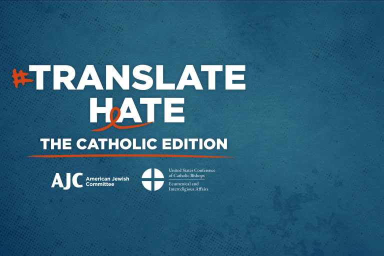 Blue background, white lettering that reads: #Translate Hate The Catholic Edition, with AJC logo and logo of United States Conference of Catholic Bishops underneath 