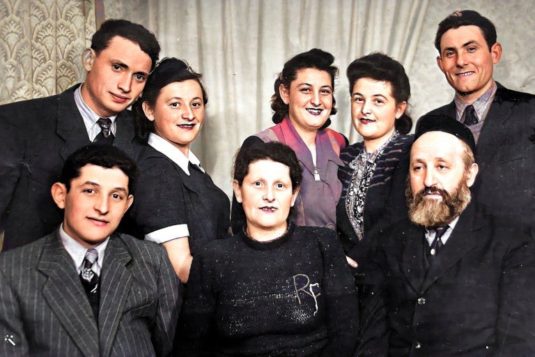 A group of the Fink family posing for a photo together in 1950.