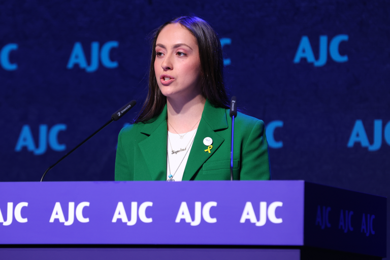Photo of Jaqueline Smeke receiving AJC's Sharon Greene Award