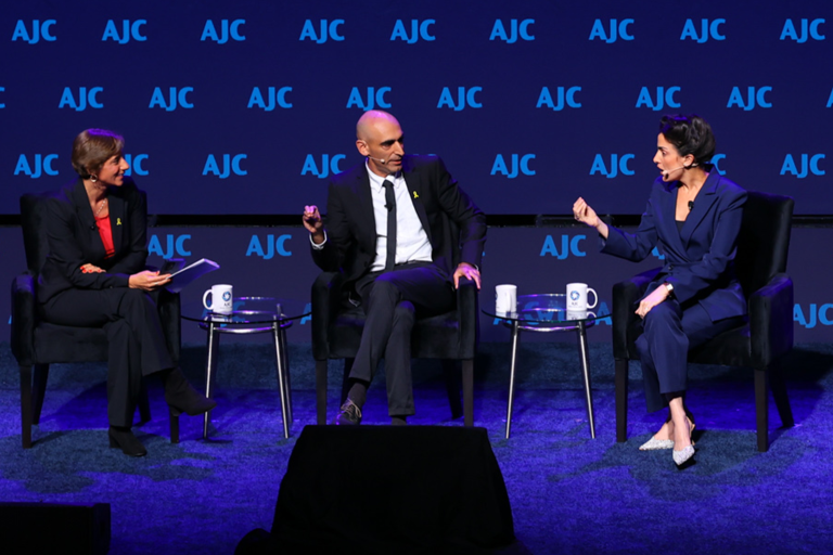 Photo of three of Israel’s leading journalists—Nave Dromi, Asaf Liberman, and moderator Nurit Canetti at AJC Global Forum 2025