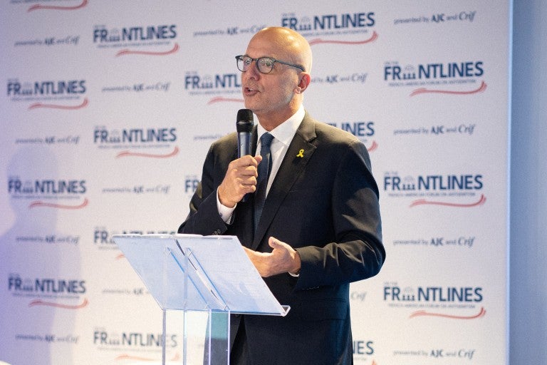 AJC CEO Ted Deutch speaking at the AJC-Crif Forum