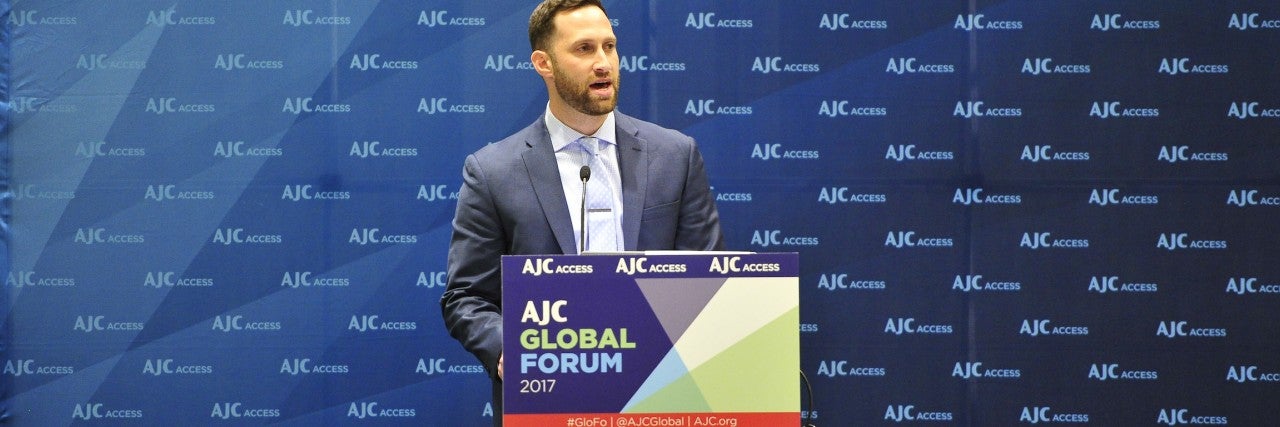 Photo of Oren Jacobson speaking at AJC Global Forum 2017