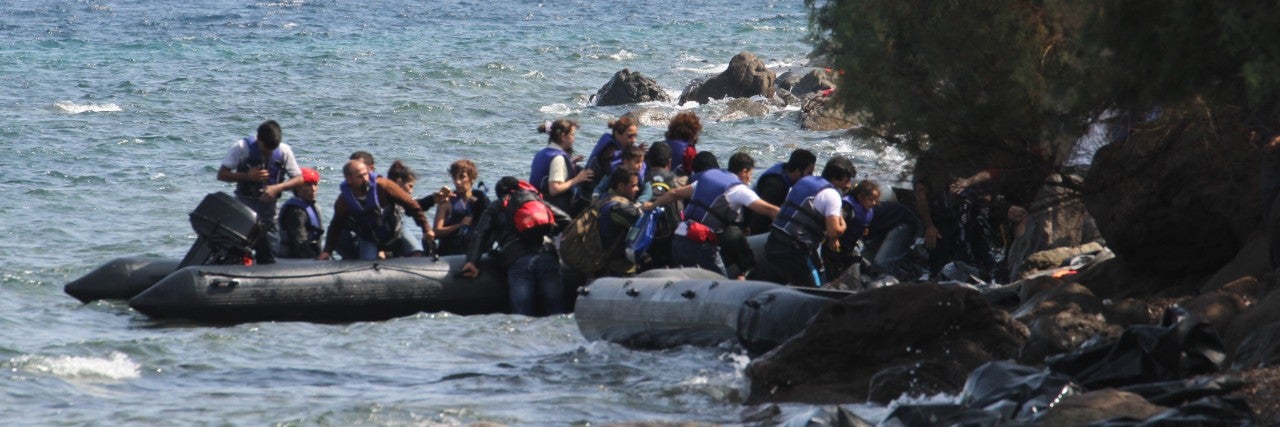 Photo of Syrian Refugees on inflatable boats