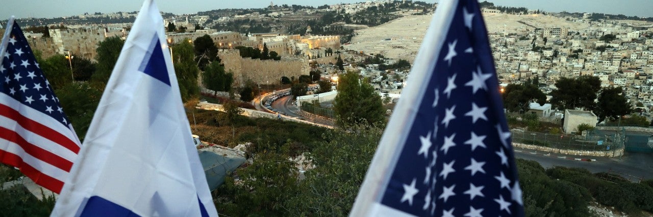 Photo of Israeli and American flags over the Old City, Jerusalem