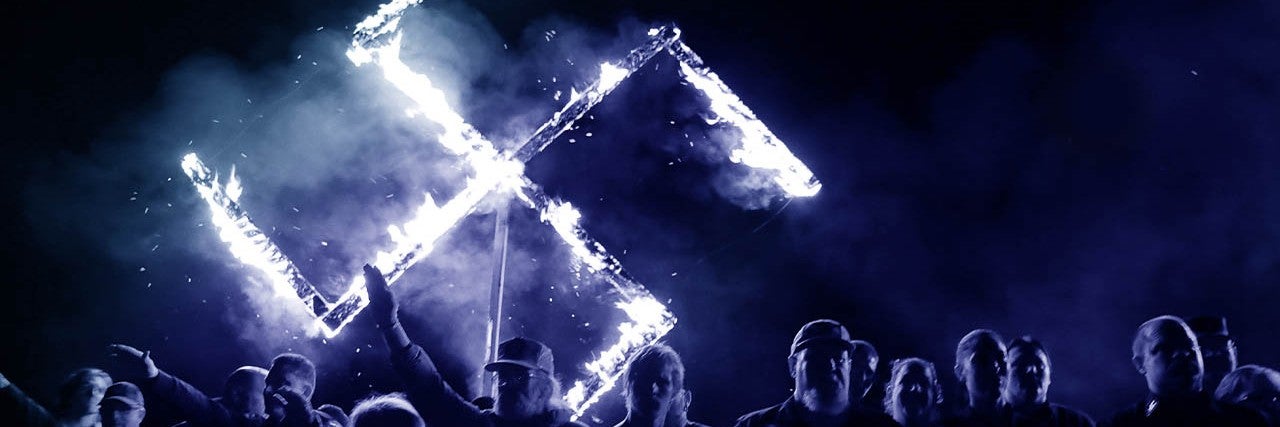 Graphic displaying burning swastika