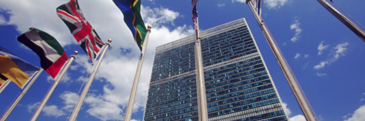 United Nations building and world flags