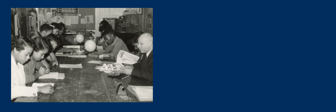 Black students studying with White professor