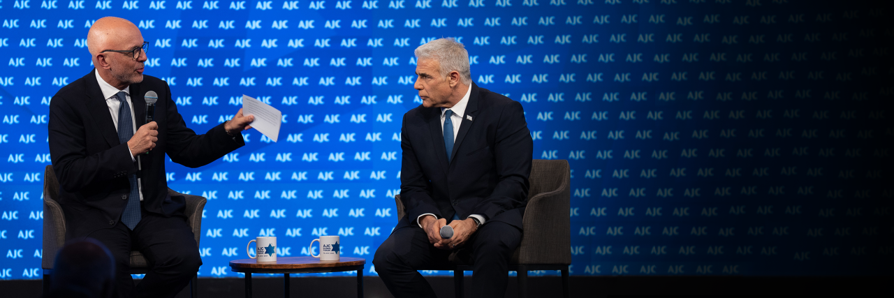 AJC CEO Ted Deutch and Israeli Opposition Leader Yair Lapid speaking at AJC Global Forum 2023