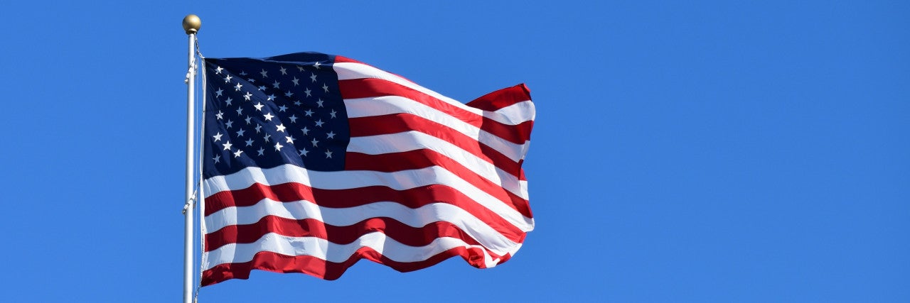 American Flag on Blue Sky