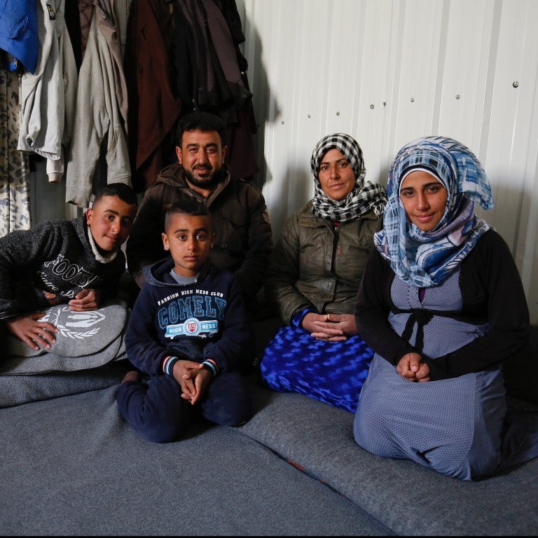 Photo of a Syrian refugee family in the Azraq camp in northern Jordan