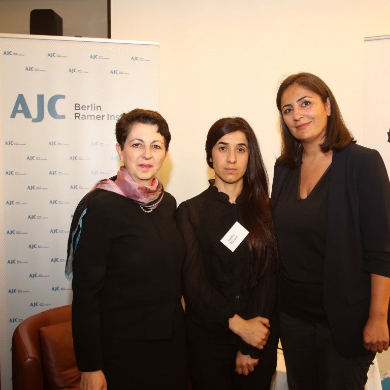 Photo of Nobel Prize Winner Nadia Murad with AJC staff in 2014