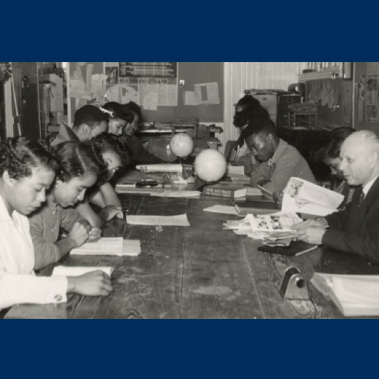 Black students studying with White professor