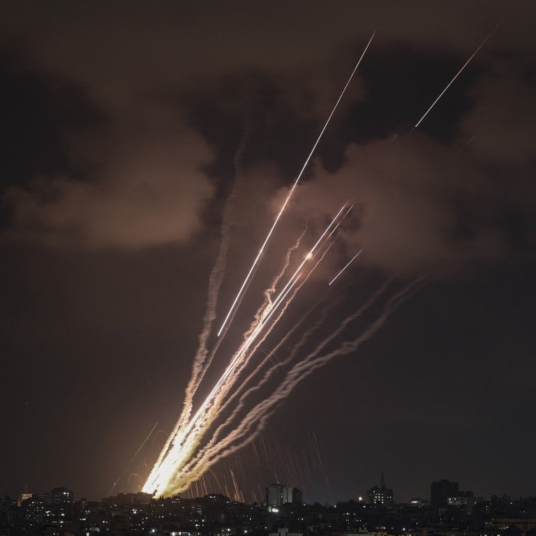  A salvo of rockets is fired from Gaza City toward Israel, on August 6, 2022. Credit: MOHAMMED ABED/AFP via Getty Images