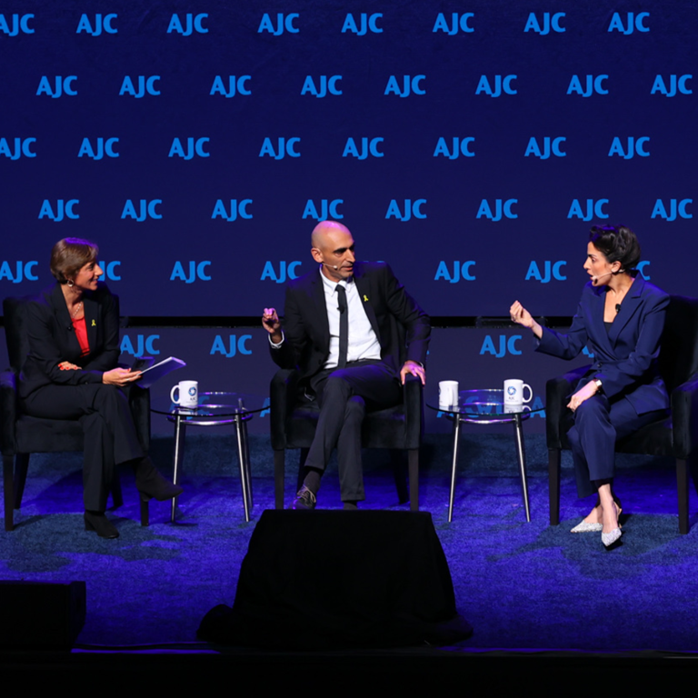 Photo of three of Israel’s leading journalists—Nave Dromi, Asaf Liberman, and moderator Nurit Canetti at AJC Global Forum 2025