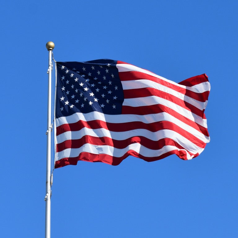 American Flag on Blue Sky