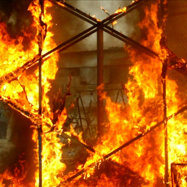 Star of David turned on its side and on fire 